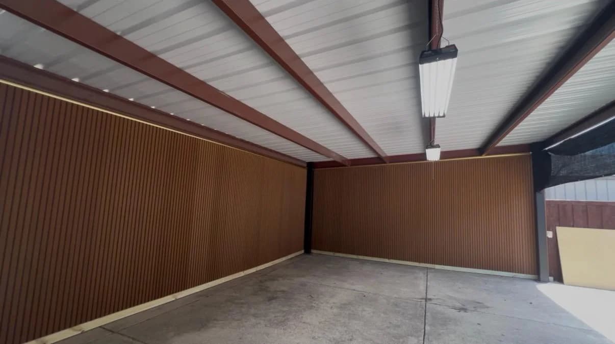 Interior of the completed carport looking down the length of the structure