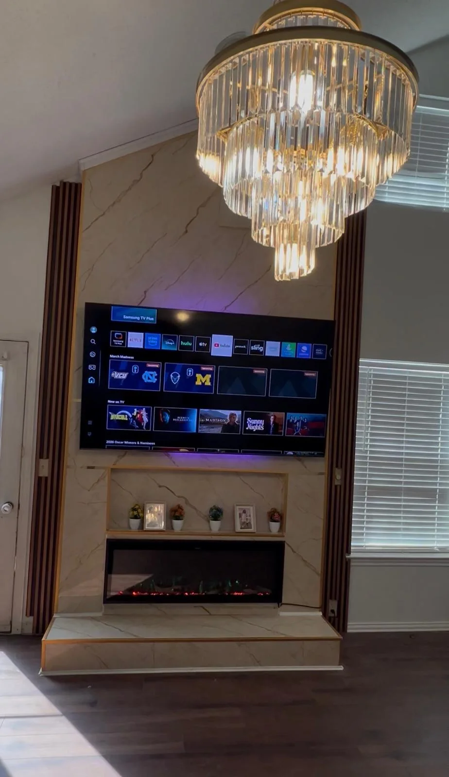 Detail of the porcelain slab surround and linear electric fireplace